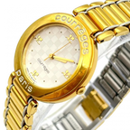 COURRÈGES Montre cadrant echec bicolor or et argent femme