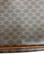 CÉLINE Paris Pochette wristlet toile Macadam marron zip façade