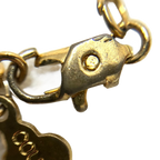 COURRÈGES Collier Pendentif Or Coeur entrelassé et strass Logo