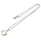 COURRÈGES Collier pendentif motif dauphin argent et or