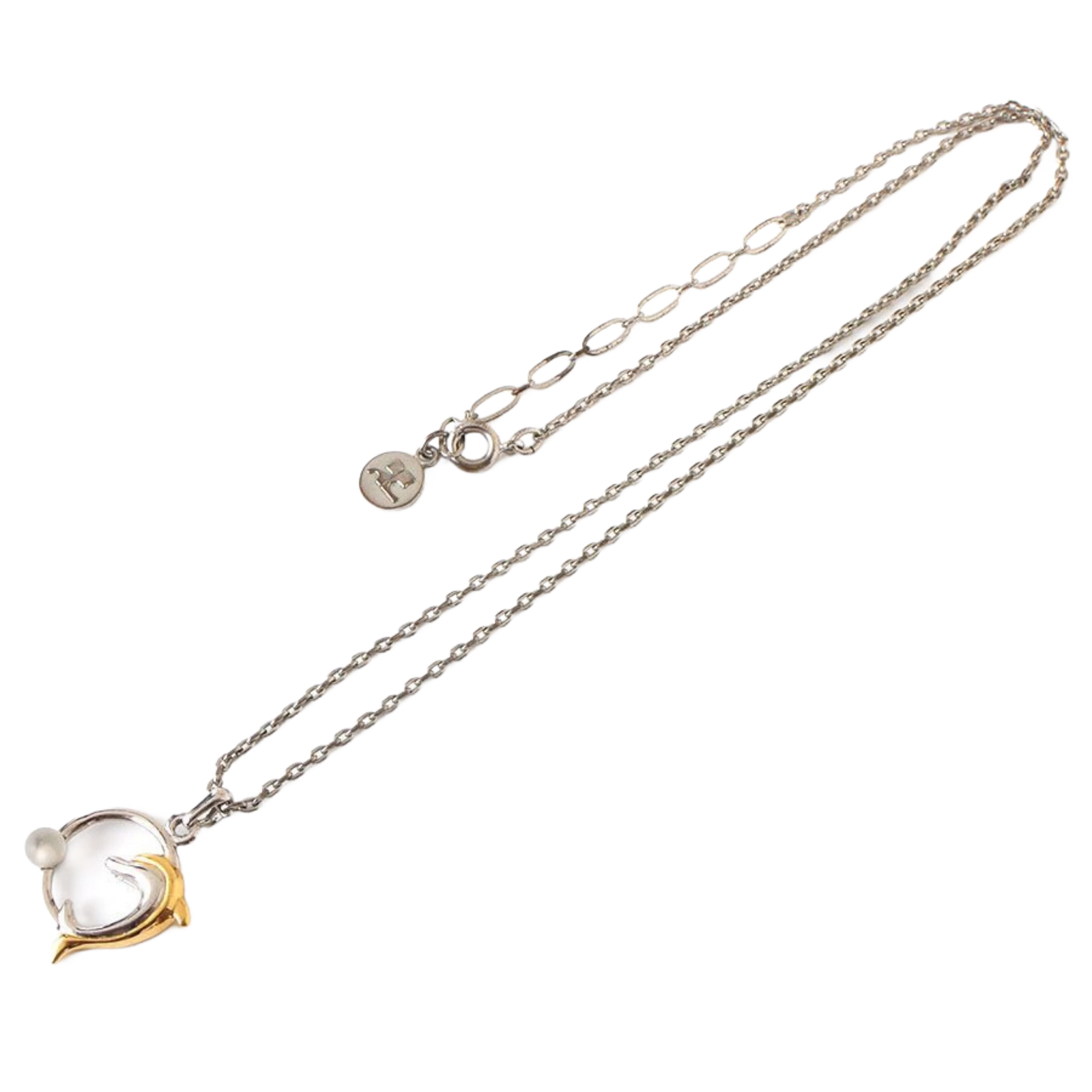 COURRÈGES Collier pendentif motif dauphin argent et or