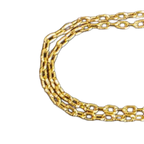 GIVENCHY Collier Givenchy, 1977, logo G, strass, or, excellent état, rare.