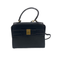 COURRÈGES Sac Uvara cuir noir lisse nœud doré