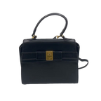 COURRÈGES Sac Uvara cuir noir lisse nœud doré
