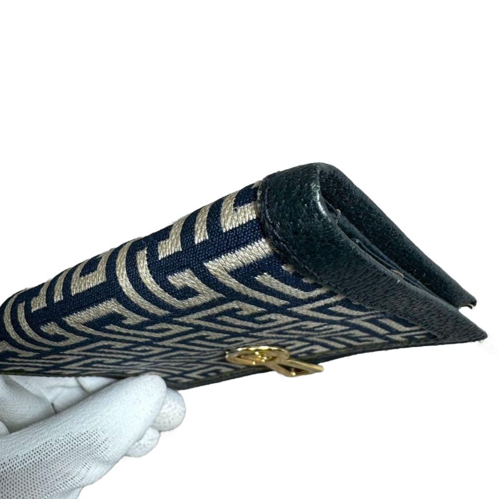 PIERRE BALMAIN Portefeuille à deux volets, orné d'un motif intégral et de finitions dorées